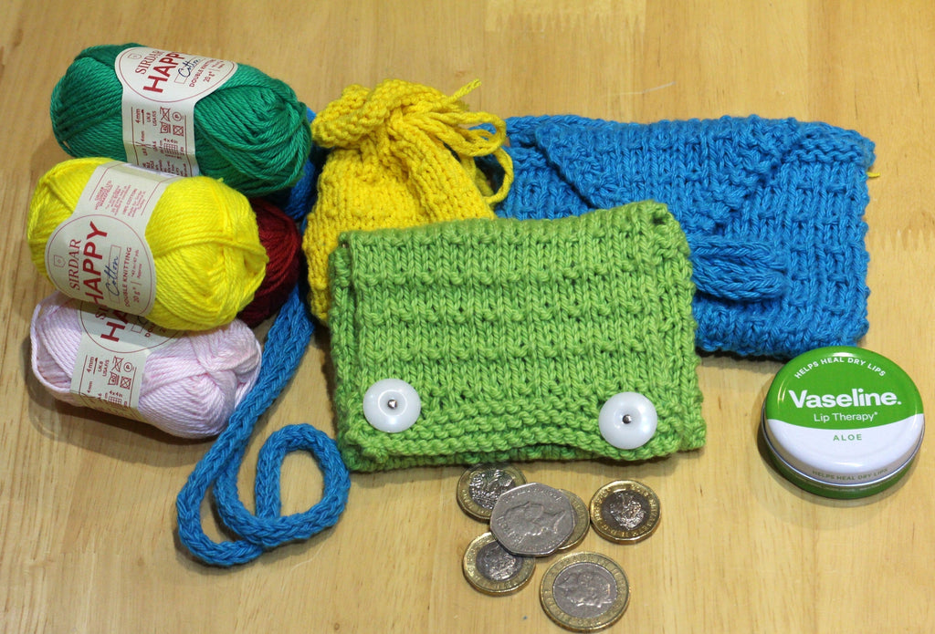 3 coin pouches with some lip balm and coins
