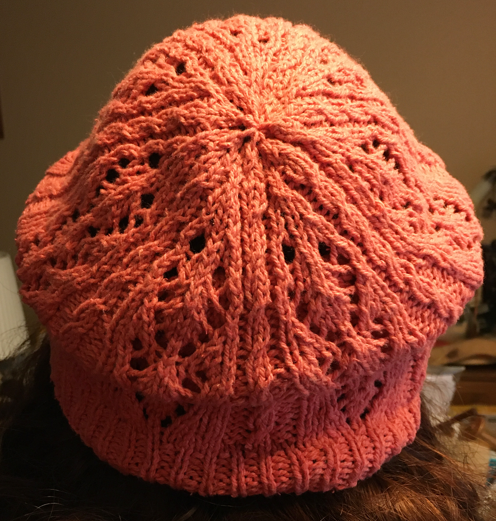 Pink lacy hat viewed from the back
