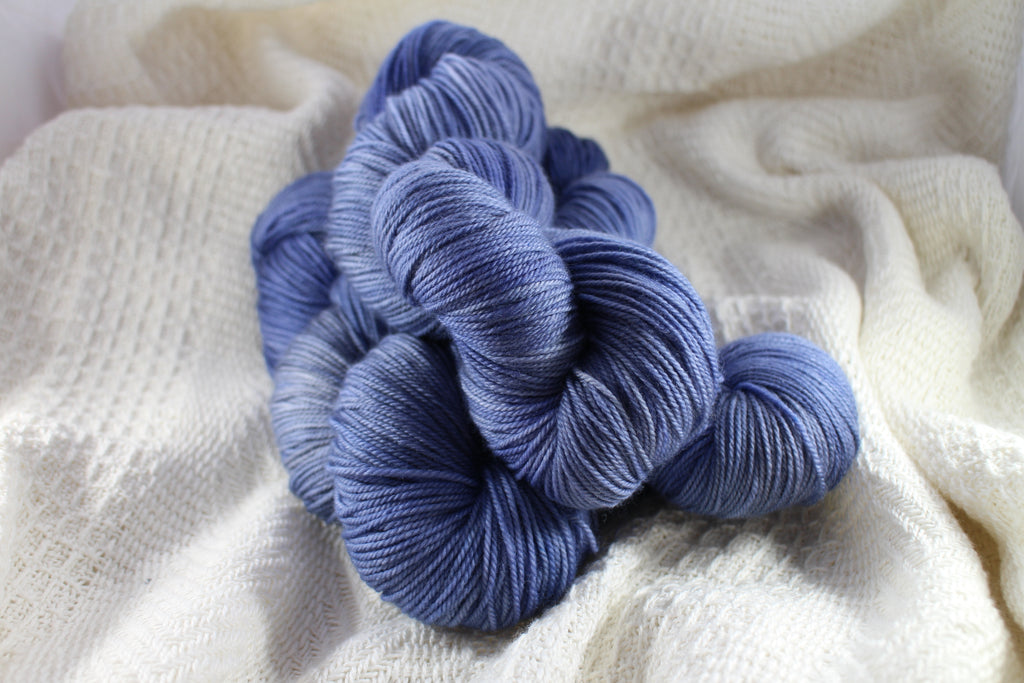 Skein of colourful hand dyed yarn by Crates of Wool