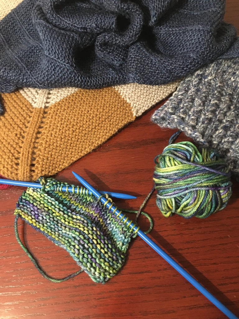 Picture of knitted items and some knitting in progress